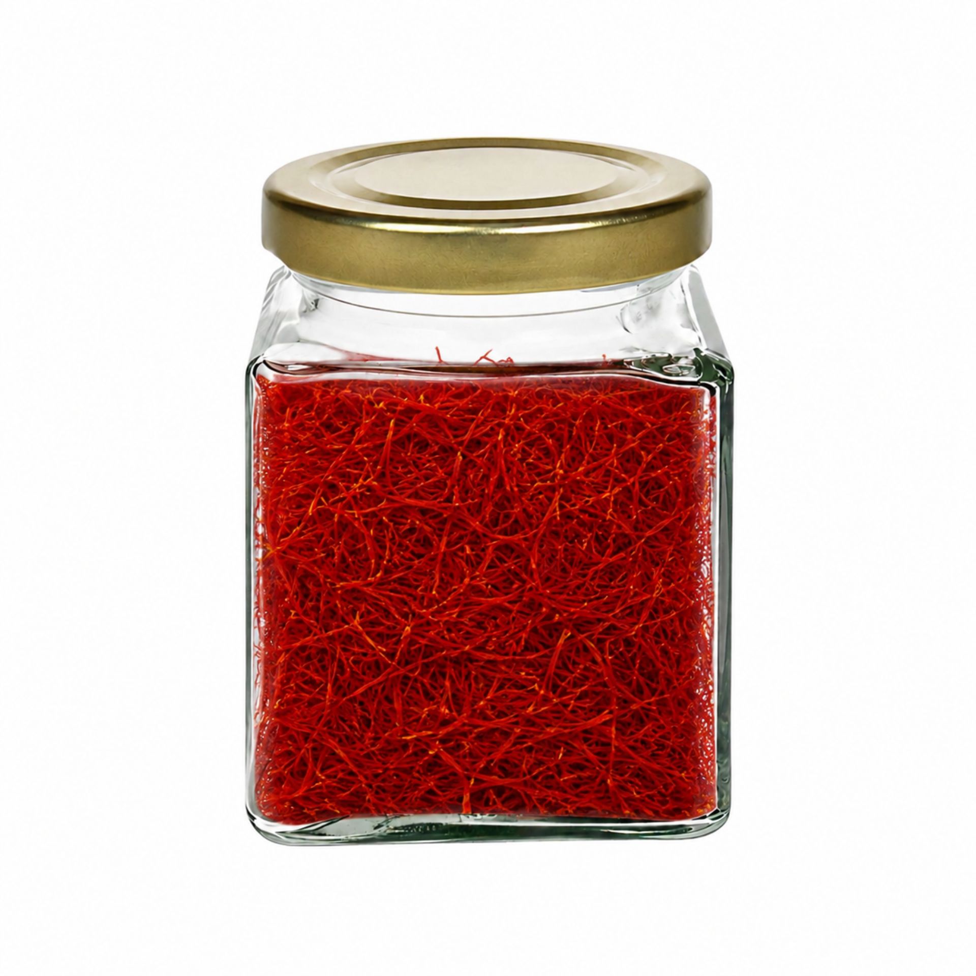 Zwei Flaschen Paulaner Spezi mit orange-blauem Etikett stehen auf einem Holztisch im Freien; im Hintergrund sind grün-bewachsene Bäume und ein sonniger Himmel zu sehen.