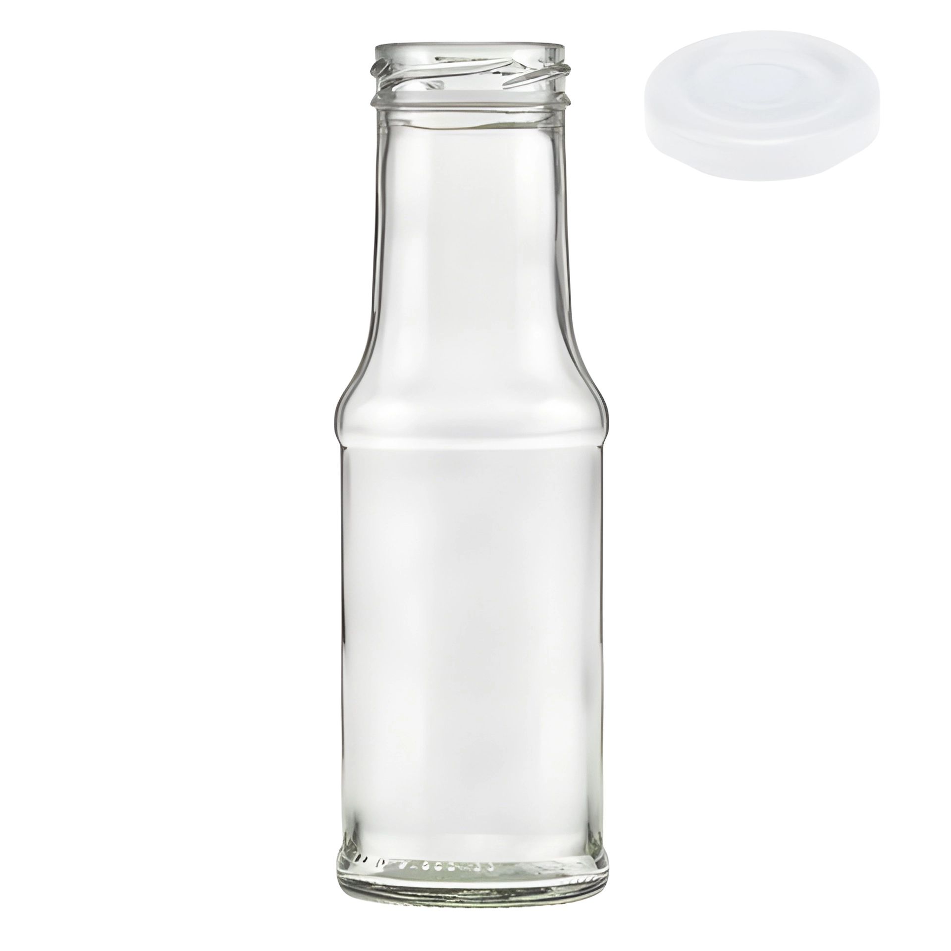 Klare Glasflasche mit 200 ml Fassungsvermögen, gefüllt mit goldenem Saft; daneben drei verschlossene Exemplare mit gold-, silber- und schwarzem Metalldeckel; auf weißem Hintergrund.